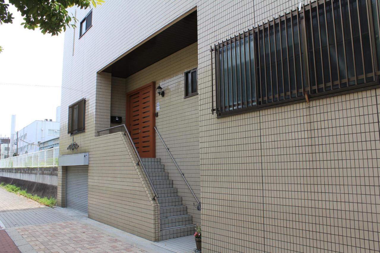 Guest House Apple Osaka Esterno foto