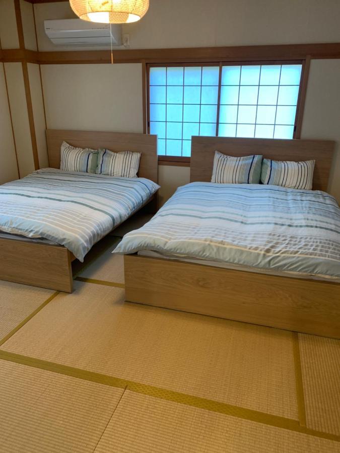 Guest House Apple Osaka Esterno foto