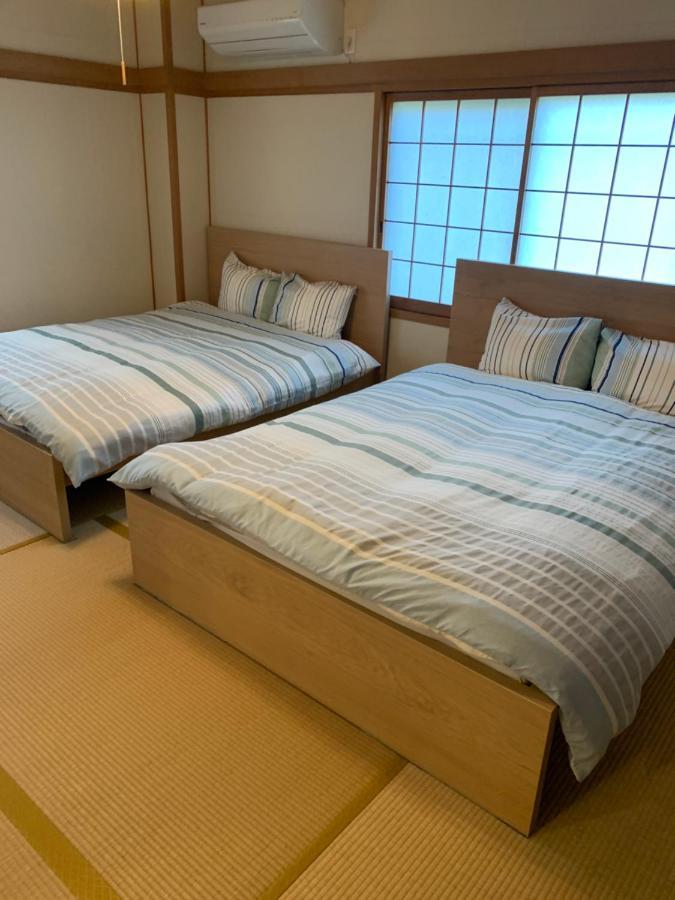 Guest House Apple Osaka Esterno foto