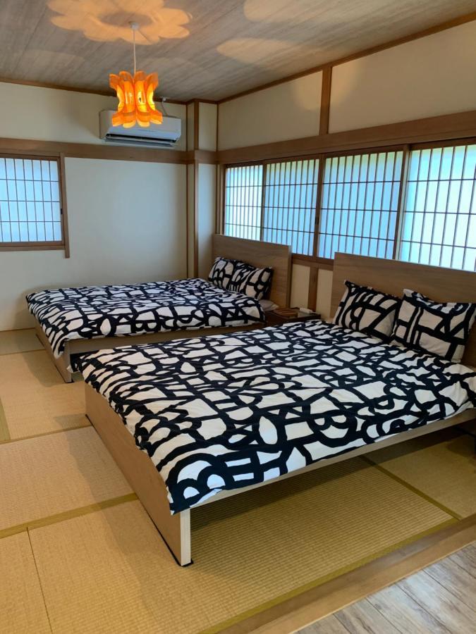 Guest House Apple Osaka Esterno foto