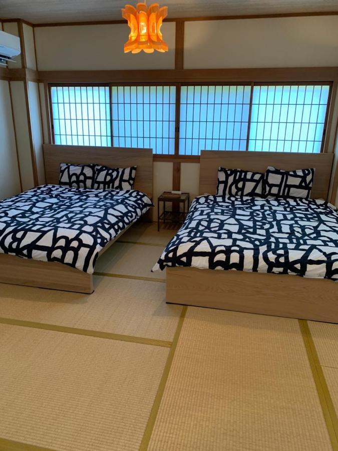 Guest House Apple Osaka Esterno foto