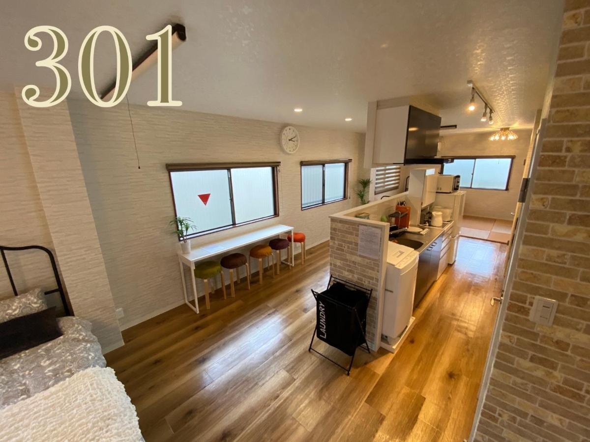 Guest House Apple Osaka Esterno foto